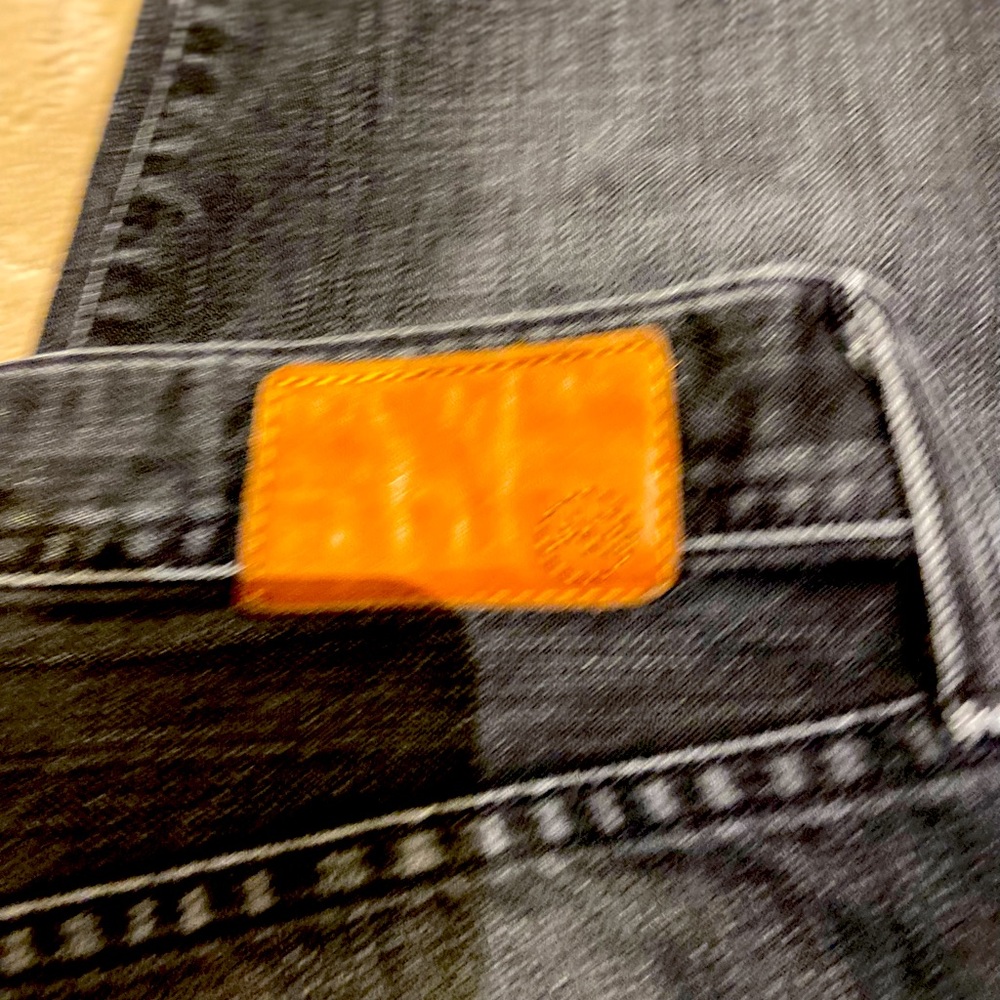 Black faded Ag men’s jeans